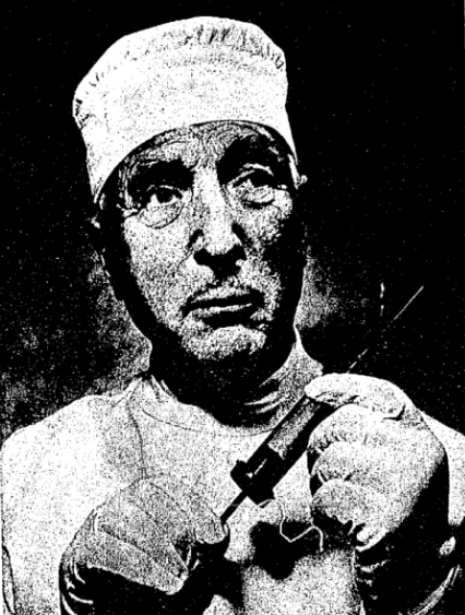 Portrait photograph of Paul Niehans, a man in a dark suit, circa 1959.